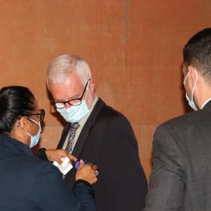 M. Jacques Barré décoré par Mme Aurélia Salé